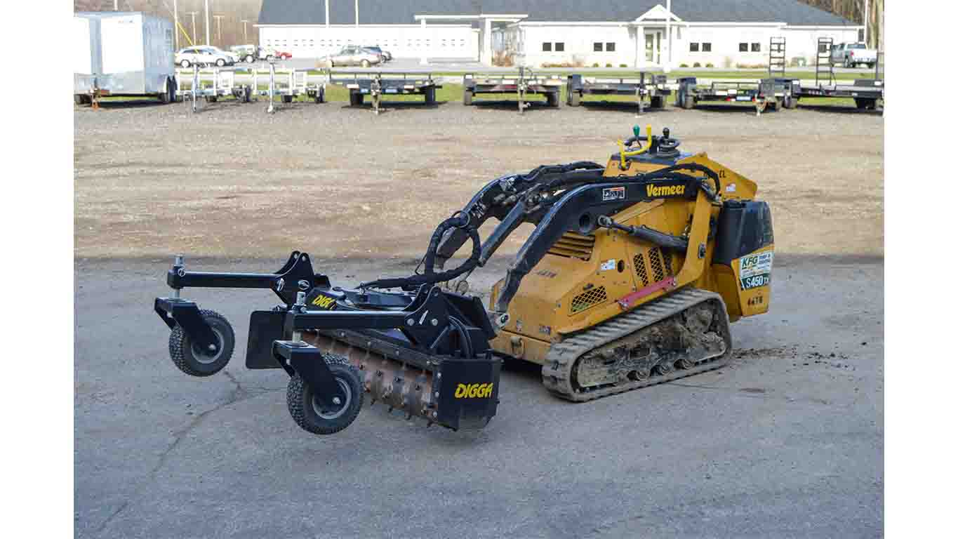 Rent A Mini Skid Steer with a Stump Grinder at TRULAND ANGOLA